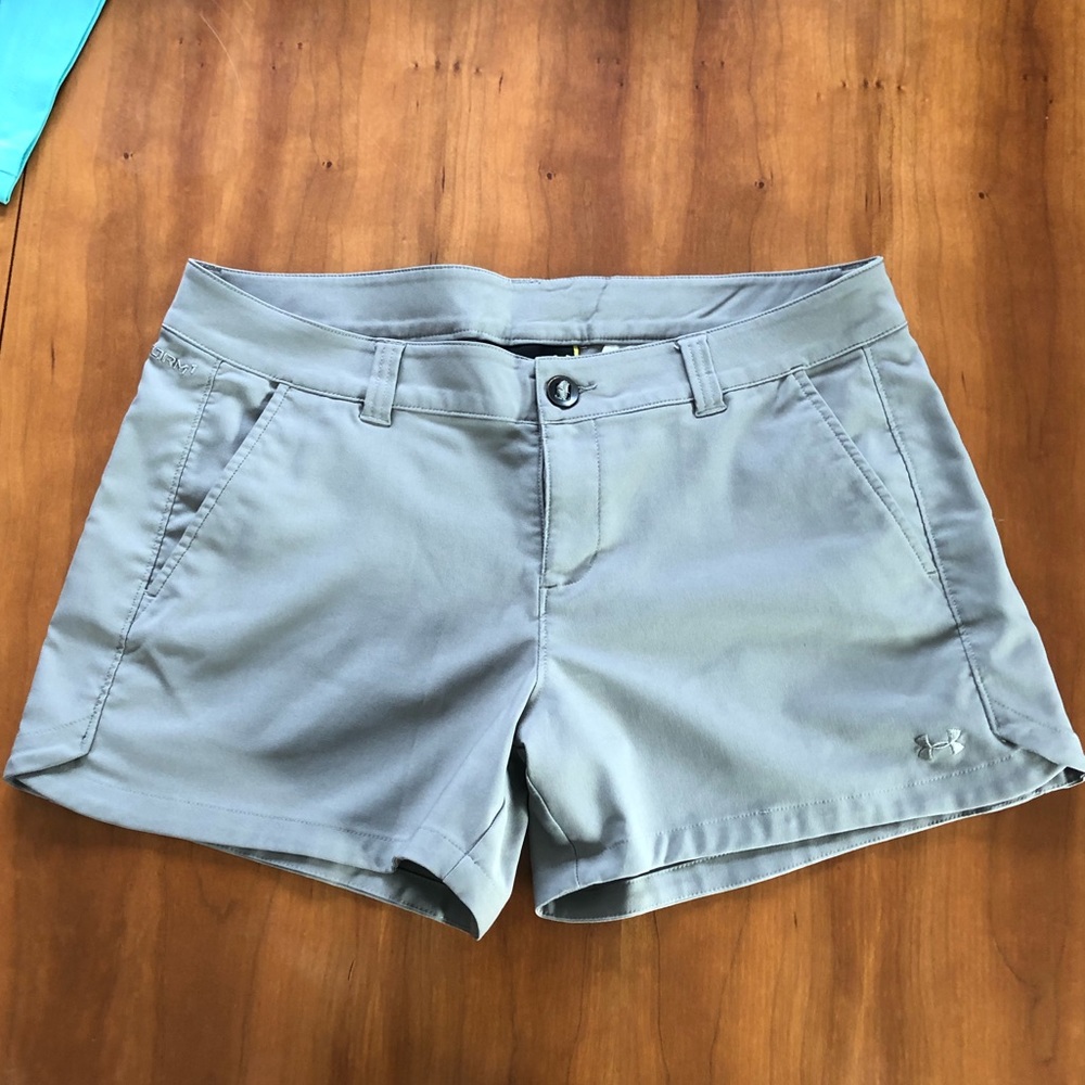 Gray women’s Under Armour golf shorts, size 14